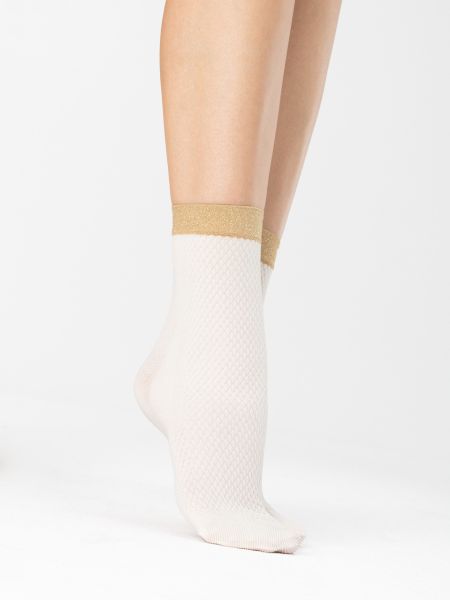 Ogenomskinliga sockor med mönster och resår med Lurex-effect i kontrastfärg från Fiore