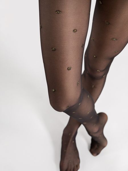 Tunn strumpbyxa med glittrande gyllene Lurex-prickar från Fiore